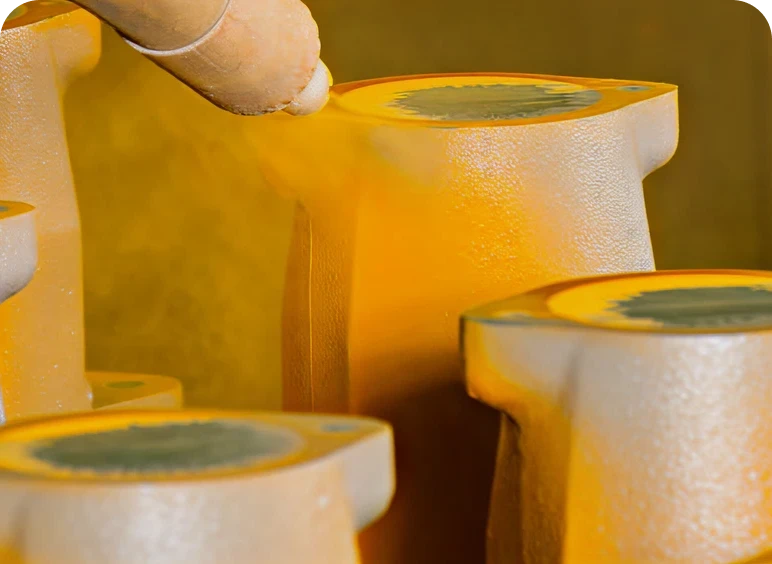Yellow powder coating on metal parts
