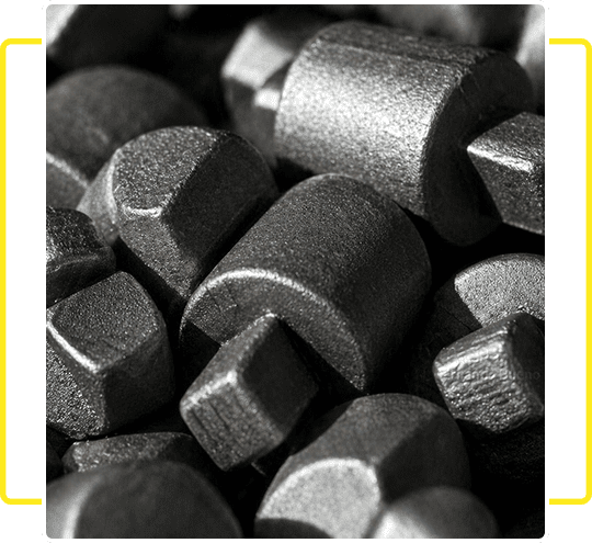 Close-up of metal hex bolts with a matte finish.