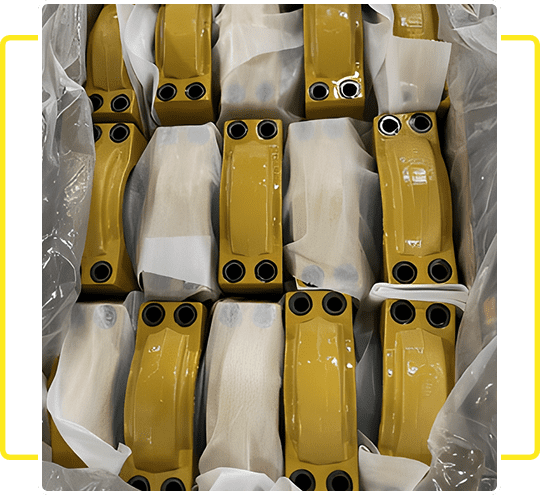 Close-up of yellow and black mechanical components neatly arranged.
